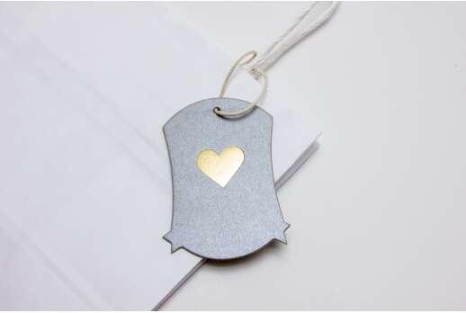 Embossed decorative tags